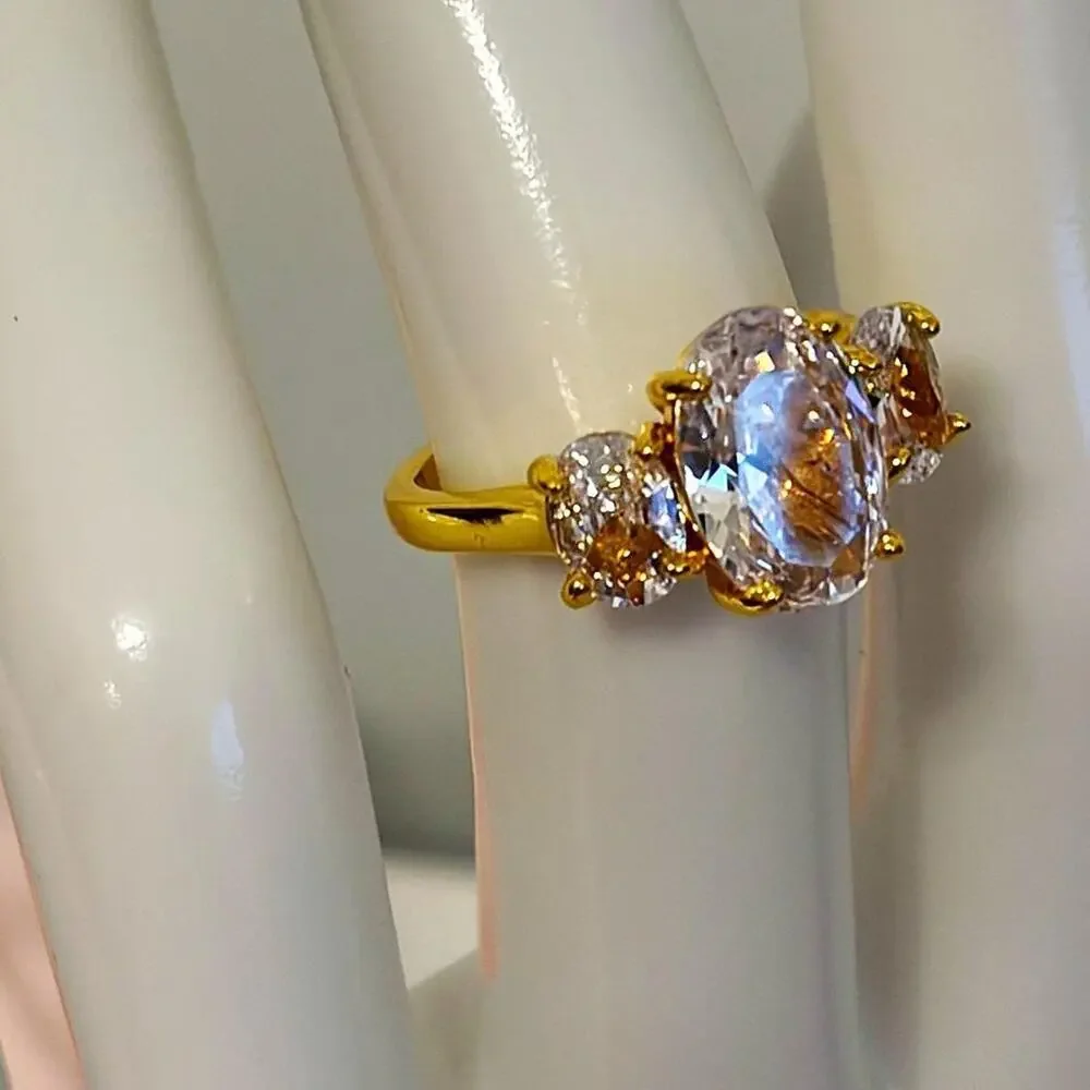 18k gold plated ring with 3 prong CZ diamonds